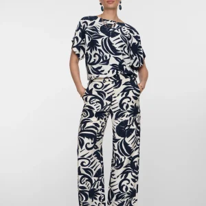 Ensemble haut et bas effet combinaison de couleur marine et blanc cassé de la marque geisha