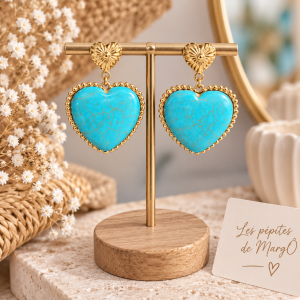 boucles d'oreilles turquoise, boucles d'oreilles cœur, boucles cœur turquoise, boucles d'oreilles dorées, boucles acier inoxydable, bijoux turquoise femme, bijoux cœur femme, boucles bohème chic, bijoux fantaisie femme, boucles pendantes turquoise, accessoire femme, bijoux dorés turquoise Craquez pour ces boucles d’oreilles cœur turquoise en acier inoxydable. Une jolie pépite bohème chic aux finitions dorées, parfaite pour illuminer vos tenues.
